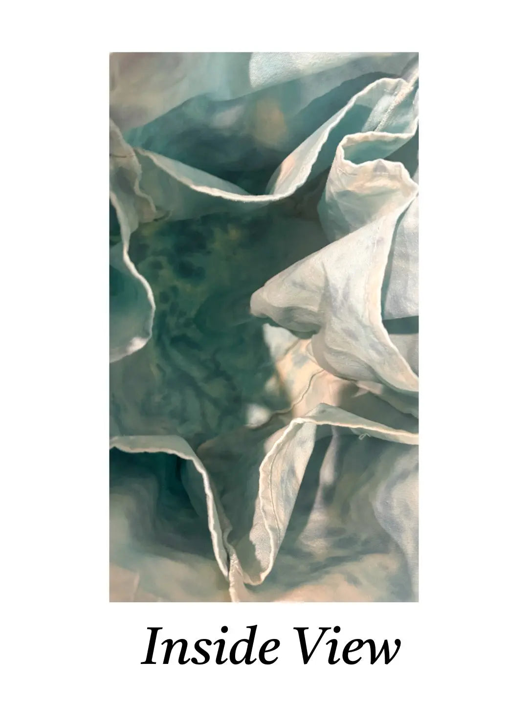 Tie-dye tote bag looking at the inside of the open pockets and text 'Inside View'