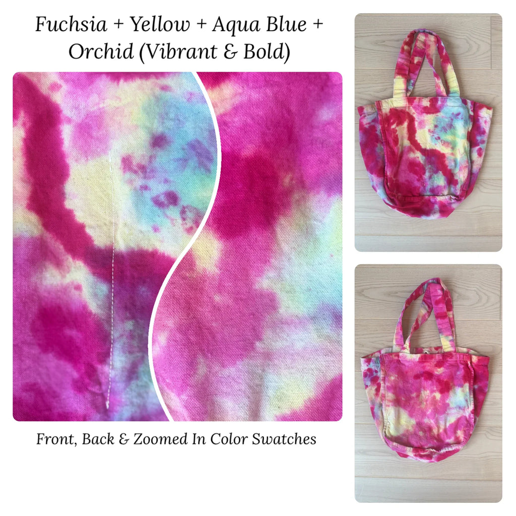 Tie-dye fabric tote bag with fuchsia, yellow, and aqua blue colors on a white background.